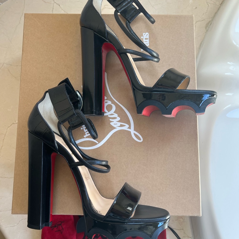 CHRISTIAN LOUBOUTIN
Atletika Platform Sandals